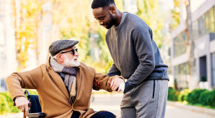 man helping a senior man